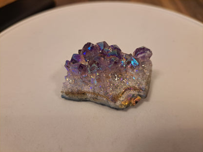 Raw aura amethyst crystal