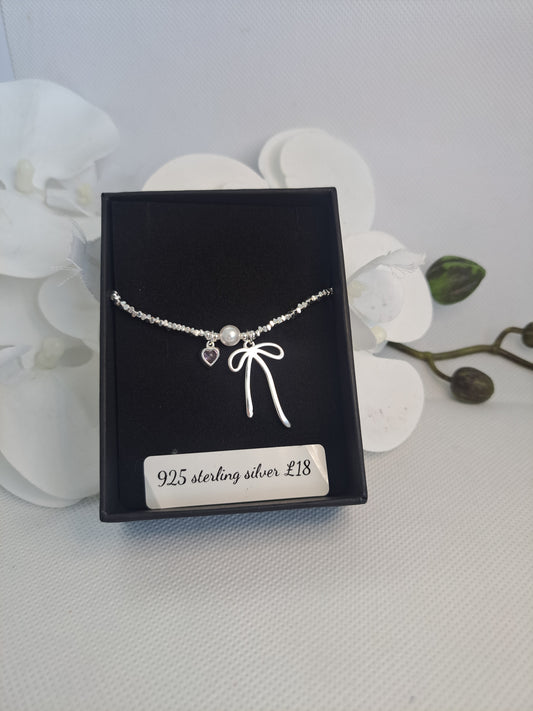 Sterling silver pretty bow design bracelet
