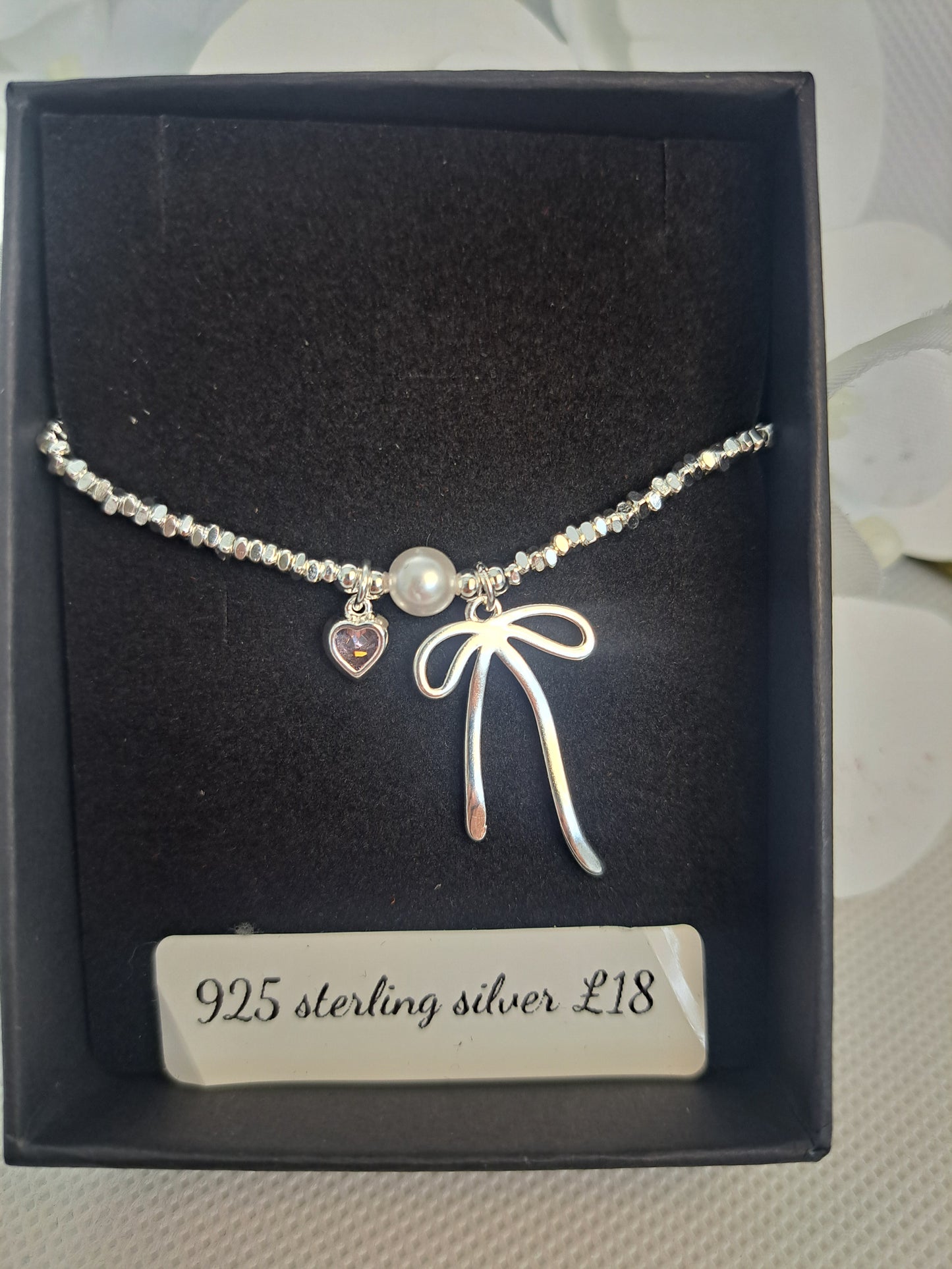 Sterling silver pretty bow design bracelet