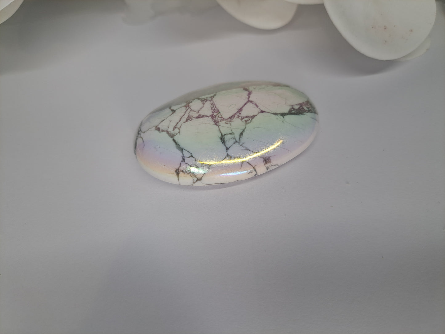 Rainbow Aura White Howlite Palm Stone